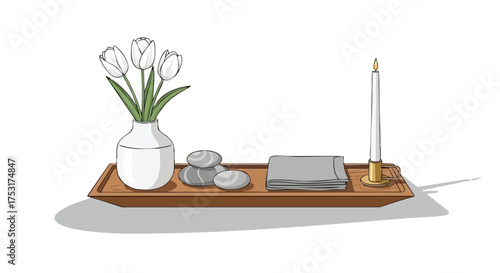 Elegant home decoration featuring white tulips, smooth stones, soft linen, and a lit candle on a tray creating a tranquil setting
