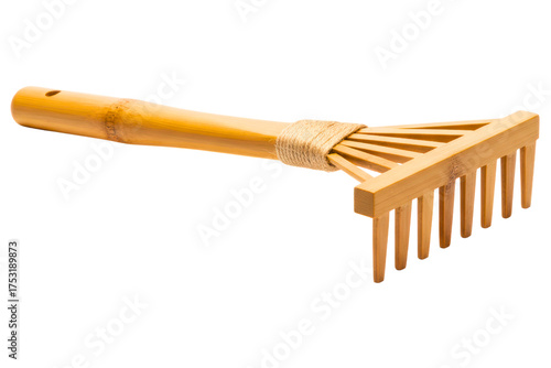 Small bamboo wood rake tool for a miniature zen garden isolated on a transparent background