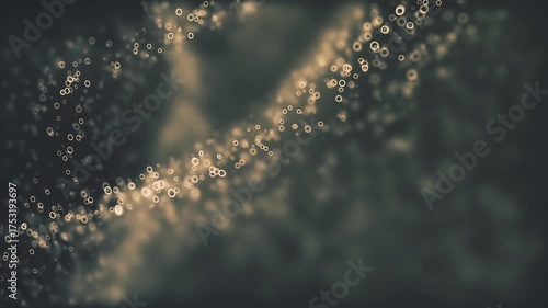 Elegant Glittering Golden Particle Stream Animation Loop.