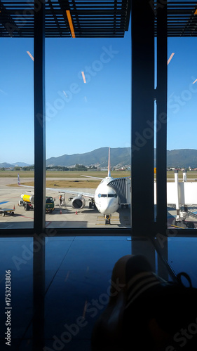 Airplane at Gate Through Window