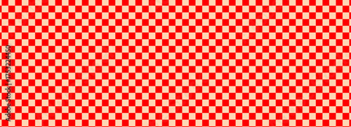 Checkerboard banner. Red and Apricot colors of checkerboard. Small squares, small cells. Chessboard, checkerboard texture. Squares pattern. Background. Repeatable texture.