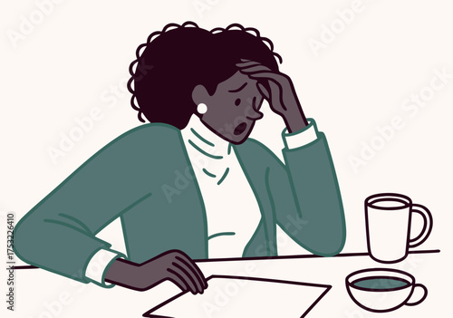 Overwhelmed Businesswoman with Head in Hand During Stressful Workday