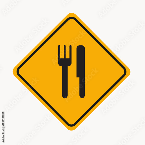 Vector art of yellow road sign with a fork and knife warns drivers that there is a restaurant or food service ahead, providing a visual cue for meal options