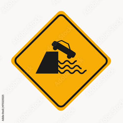 Vector art of warning sign indicating a steep dropoff or embankment ahead, the sign features a yellow diamond shape with a black border, and a black graphic depicting a car driving off a cliff into wa