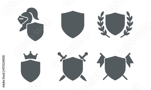 Heraldic shield icons with swords, laurel wreaths, knight helmet, and crown in minimalist style