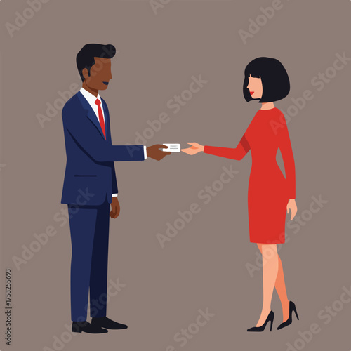 Professional handshake with a business card exchange