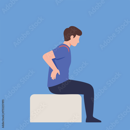 Person sitting with back pain, holding lower back