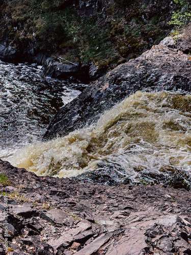 Konstfotografi Mountain river with waterfalls and gurgles in spring
