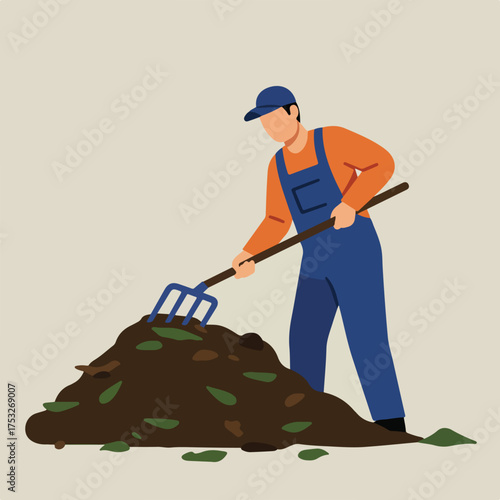Gardener in blue overalls and orange shirt uses a pitchfork in a compost pile