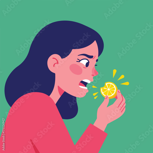 Woman reacting with disgust to biting into a sour lemon slice