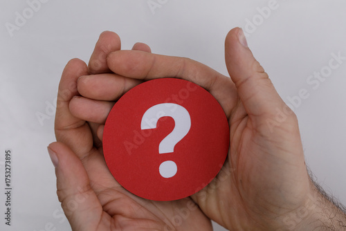 Image of hands holding a re...