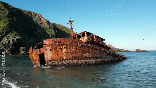 Abandoned Rusted Vessel Stranded By The Sea