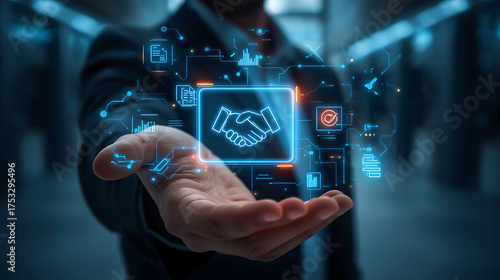 Digital partnership concept represented through holographic interface floating above businessmans hand signaling agreement and collaboration