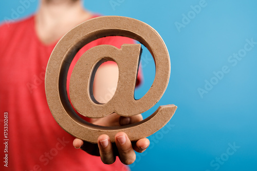 A person holding a large at...