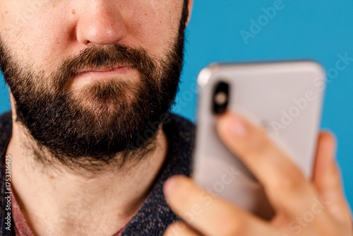 Close-up shot of a bearded ...