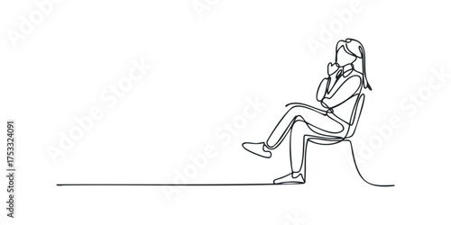 Woman sitting with chin resting on hand