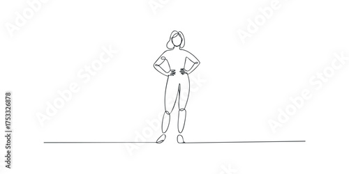 Woman Standing Confidently with Hands on Hips