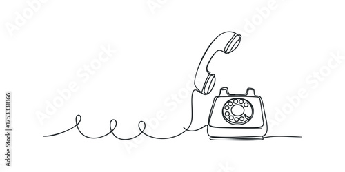 Vintage rotary dial telephone with handset lifted