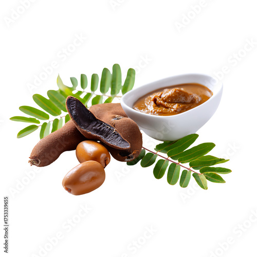 Fresh tamarind fruit, pulp, and seeds with vibrant green leaves, perfect for culinary and health use