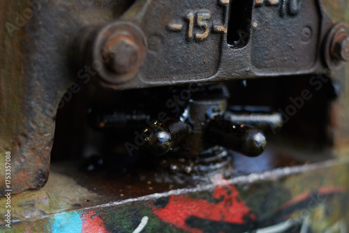 Paint on rusty metal. Rough style, background image. Railway, graffiti.