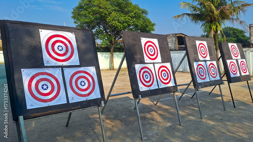 Aseries of paper shooting targets set up on stands. These types of targets are used for shooting sports and practice, archery shooting target.