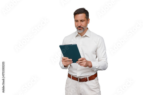 Mature businesssman using digital tablet for remote work, researching online, standing on transparent background