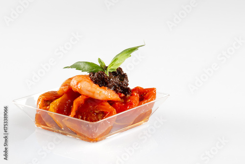 fresh seafood medley with shrimp snacks appetizers in cup healthy diet lifestyle concept on white background 