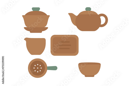 Assortment of brown clay tea ceremony items including teapot, gaiwan, serving cup, and strainer