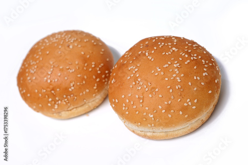 Plain hamburger buns bread isolated on white background.