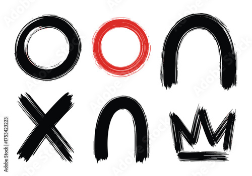 Collection of abstract grunge brush stroke shapes including circles crosses and crowns.