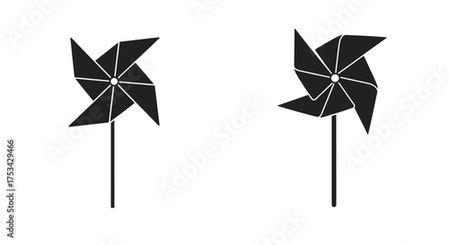 Simple black and white illustration of two pinwheel toys on stems