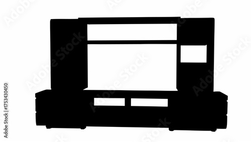 Silhouette of a modern entertainment center with shelves and cabinets providing ample storage space decor