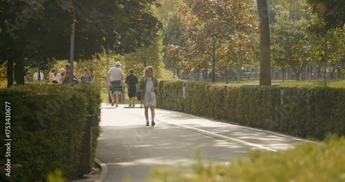 Wallpaper Mural Woman walking outside in city park for healthy active body workout. Morning walks of future mom breathing fresh air. Torontodigital.ca