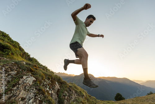 Wallpaper Mural Man trail running in the Pyrenees at sunrise Torontodigital.ca