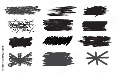 Collection of twelve black grunge brush stroke textures and abstract shapes isolated on transparent background