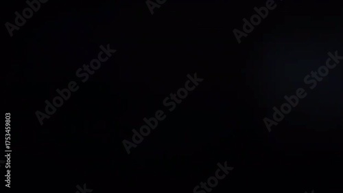 Realistic light leak overlay with smooth lens flare for cinematic video backgrounds.