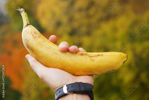 hand holding banana