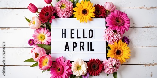 hello april is a beautiful floral wreath with the word hello written on it