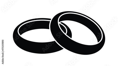 Two simple black wedding rings intertwined symbolizing love and commitment