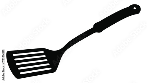 Black slotted spatula kitchen utensil for flipping food on a white background