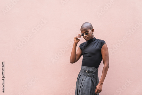 Young LGBTQ man expressing unique fashion style