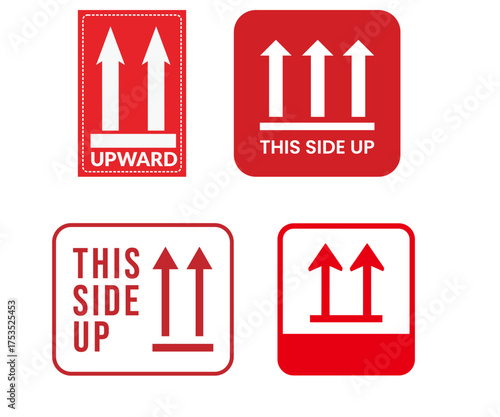 Set of four red and white fragile package handling labels indicating 'This Side Up' with upward arrows.