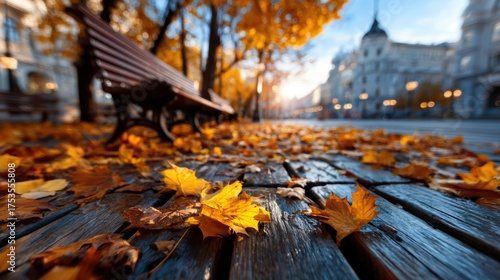 Stroll through a serene path adorned with crisp autumn leaves, radiating in golden sunlight, inviting you to savor the beauty of nature and the change of seasons.