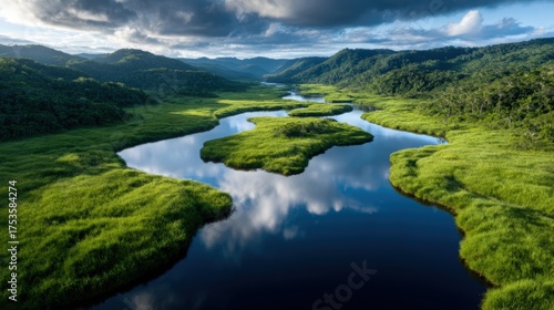 A stunning view of a serene river weaving through vibrant, lush green landscapes, creating a harmonious connection between water and nature's foliage.