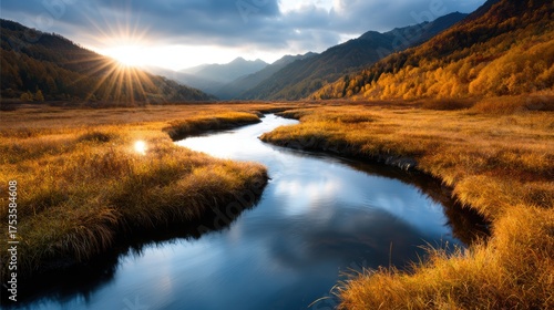 Experience the tranquility of a stunning autumn landscape showcasing a meandering river flanked by golden foliage and majestic mountains under a dreamy sky.