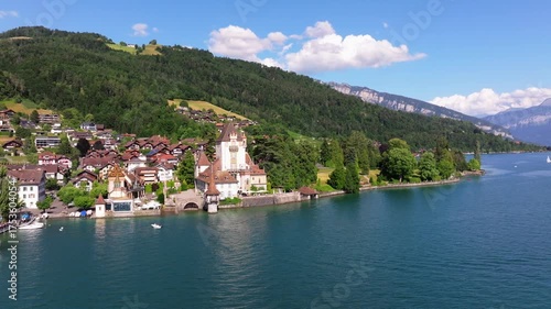 The beautiful Interlaken valley and Thunersee lake, Beatiful river at Switzerland in sunny day during summer, Aereal drone view of stunning idyllic nature scenery of lake Brienz with turquoise waters