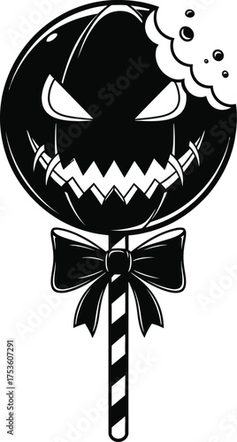 Spooky halloween pumpkin face lollipop with a bite mark and a bow on a striped stick