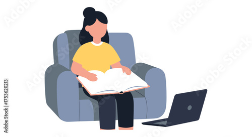 An open book lying on a comfortable chair with a closed laptop nearby