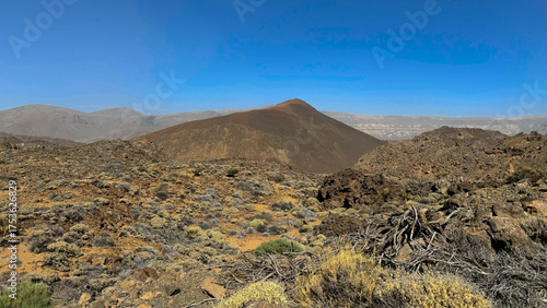 Desert, yellow rocks against the blue sky. Scenic ascent to Mount Teide, Tenerife