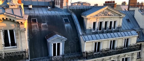 Sunset hues and architectural charm: Capturing the essence of Parisian rooftops in golden light